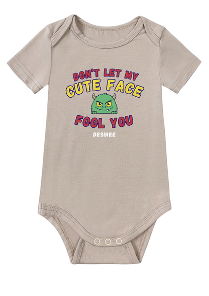 Don't Let My Cute Face Fool You Baby Onesie